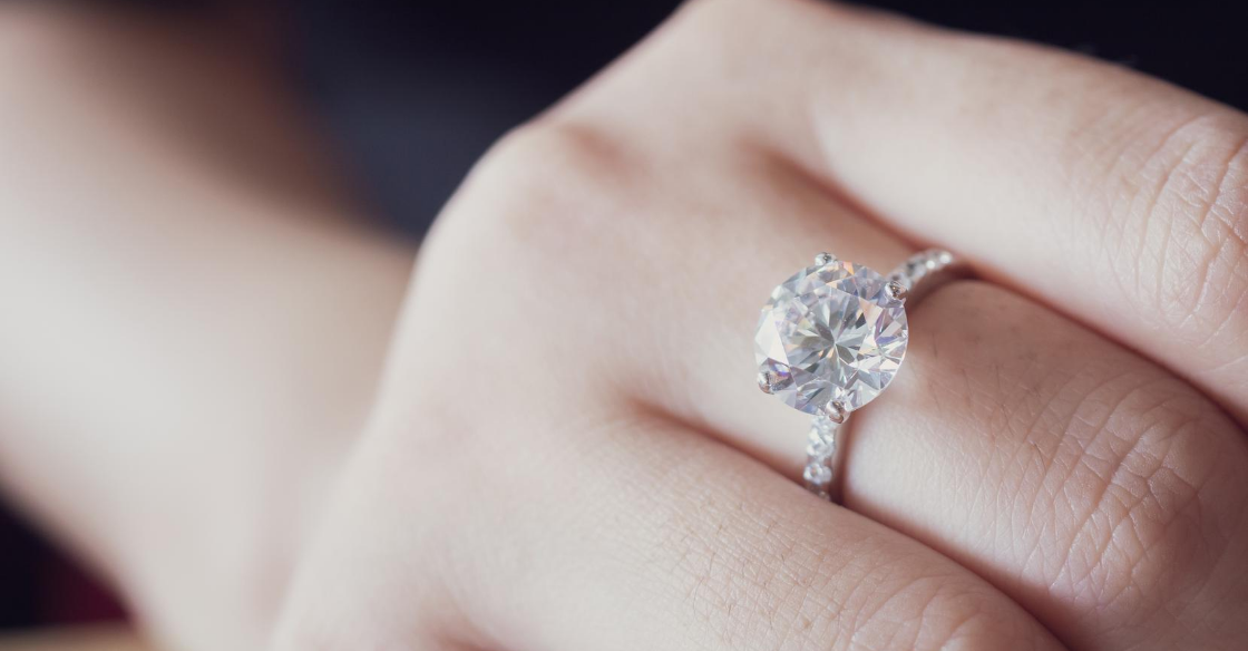 Woman wearing a diamond engagement ring